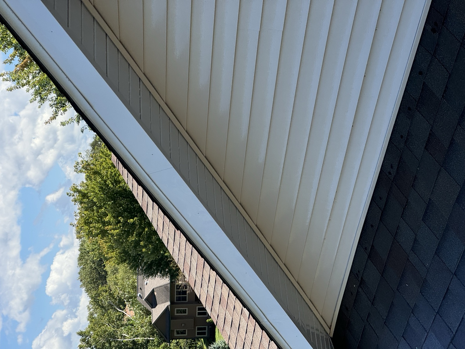 Freshly soft-washed clean siding and roofline