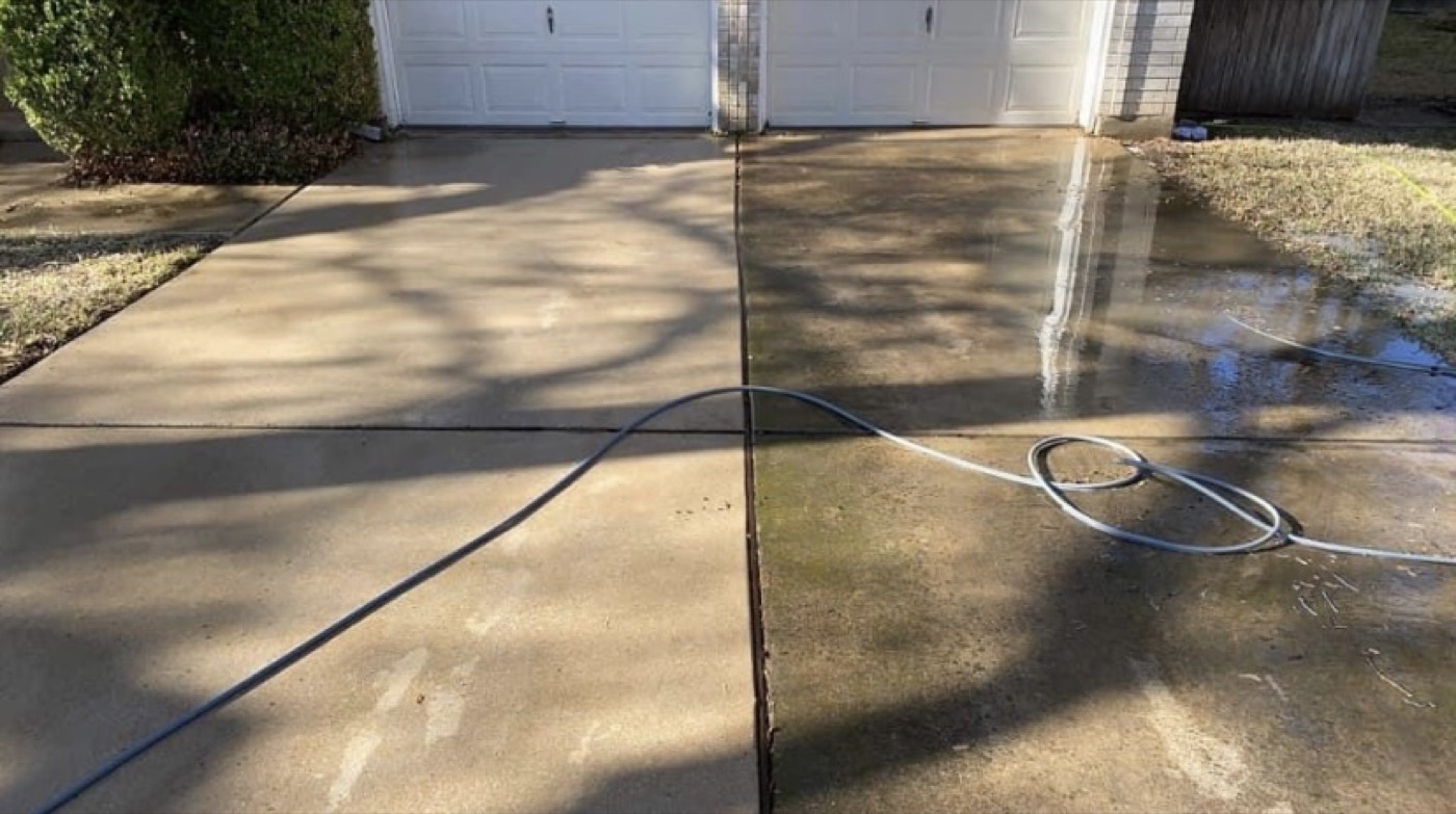 Driveway power washing in progress